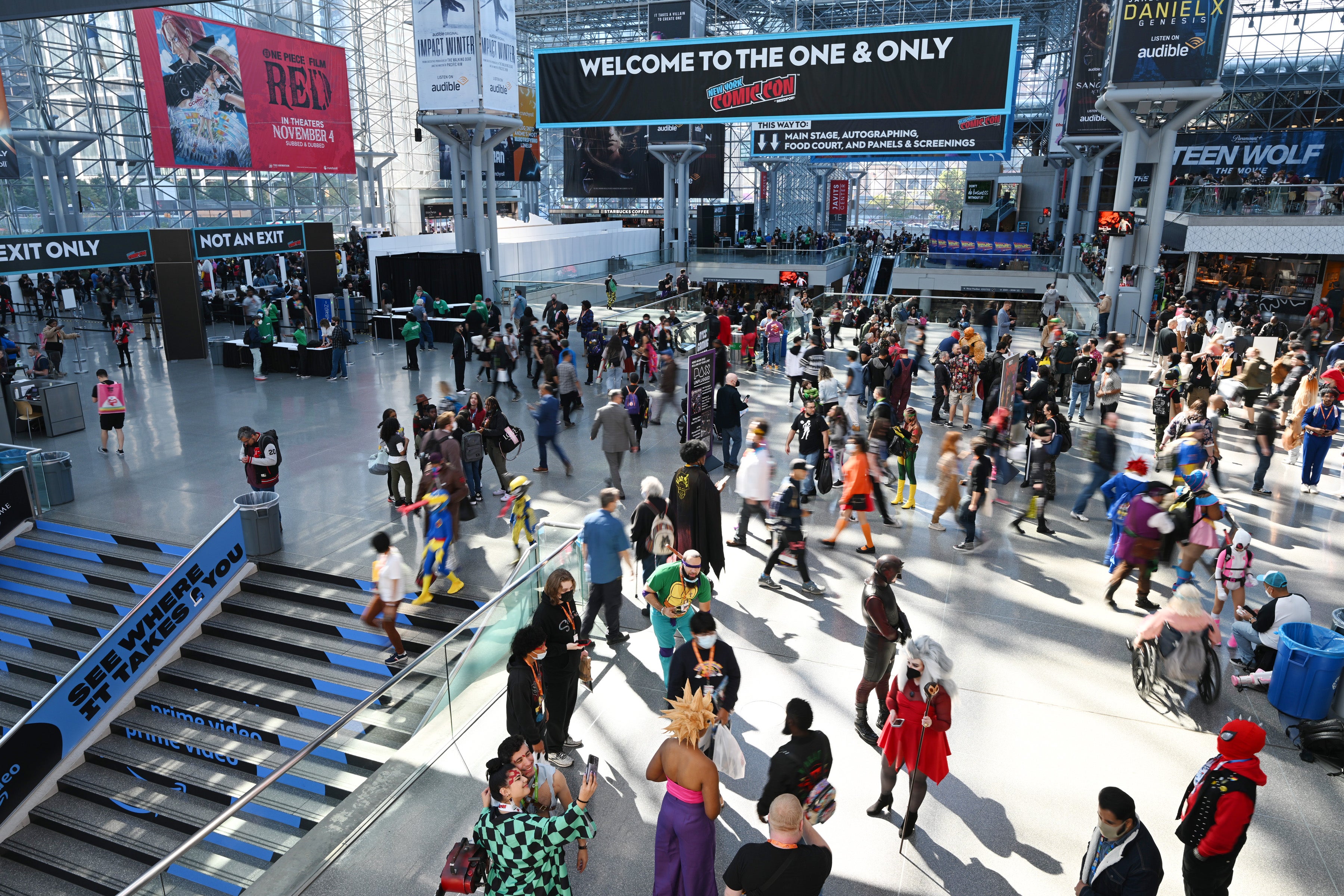Photograph of interior of Javits center during NYCC 2022 featuring people walking