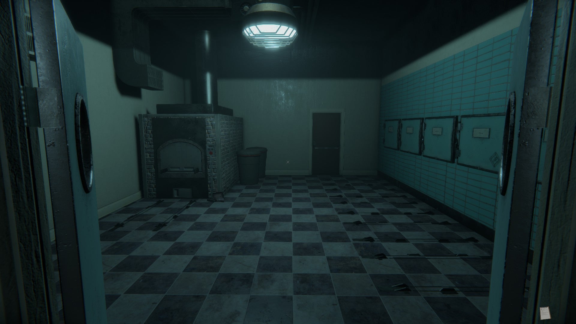 A darkened morgue room, with a cremation oven on the left, a chequered black and white floor, pale and weak white light, and cold storage vaults on the right.
