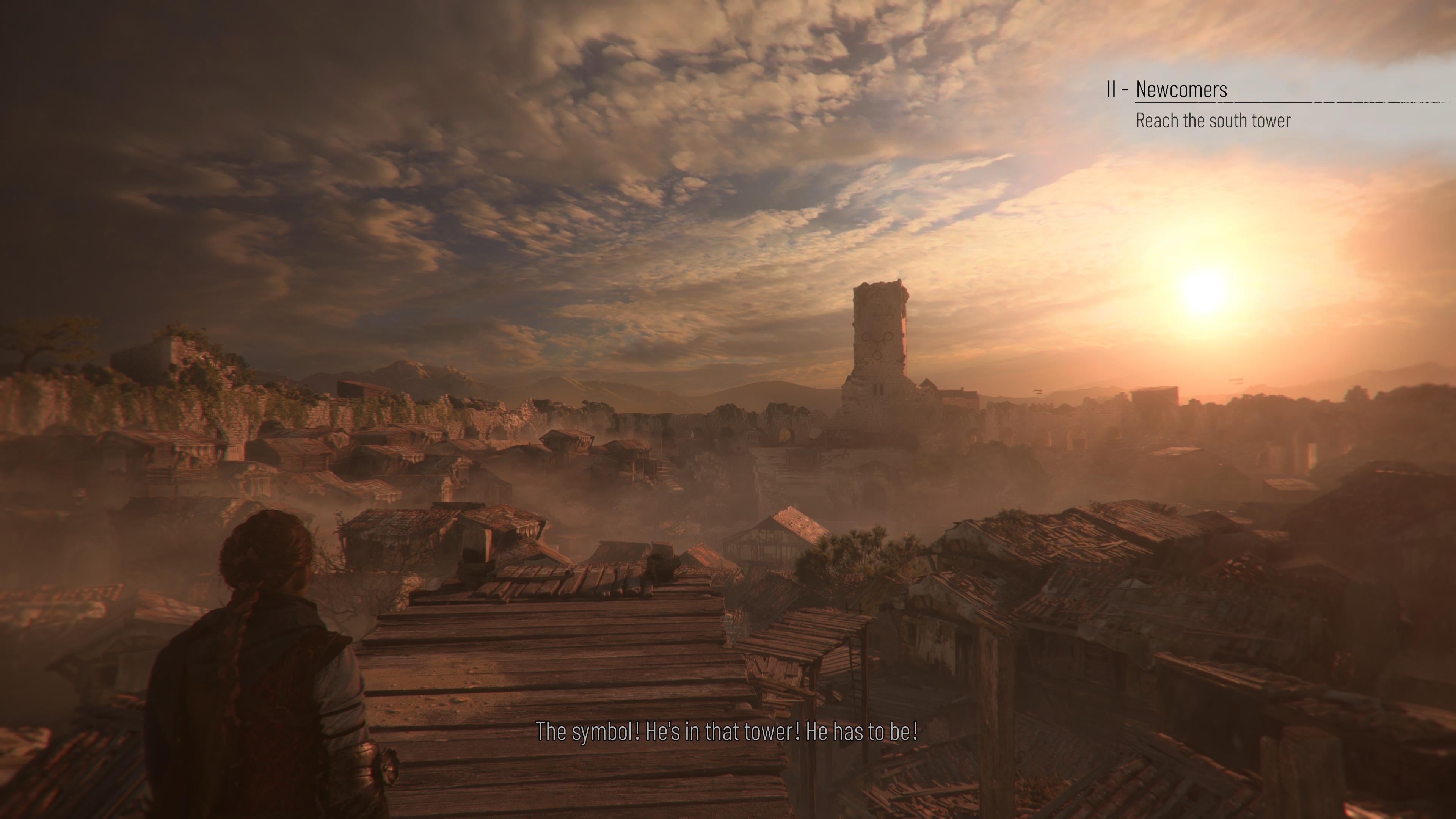 An evening shot of a town in 14th-century France, all dusty and lit by a big blazing sun.