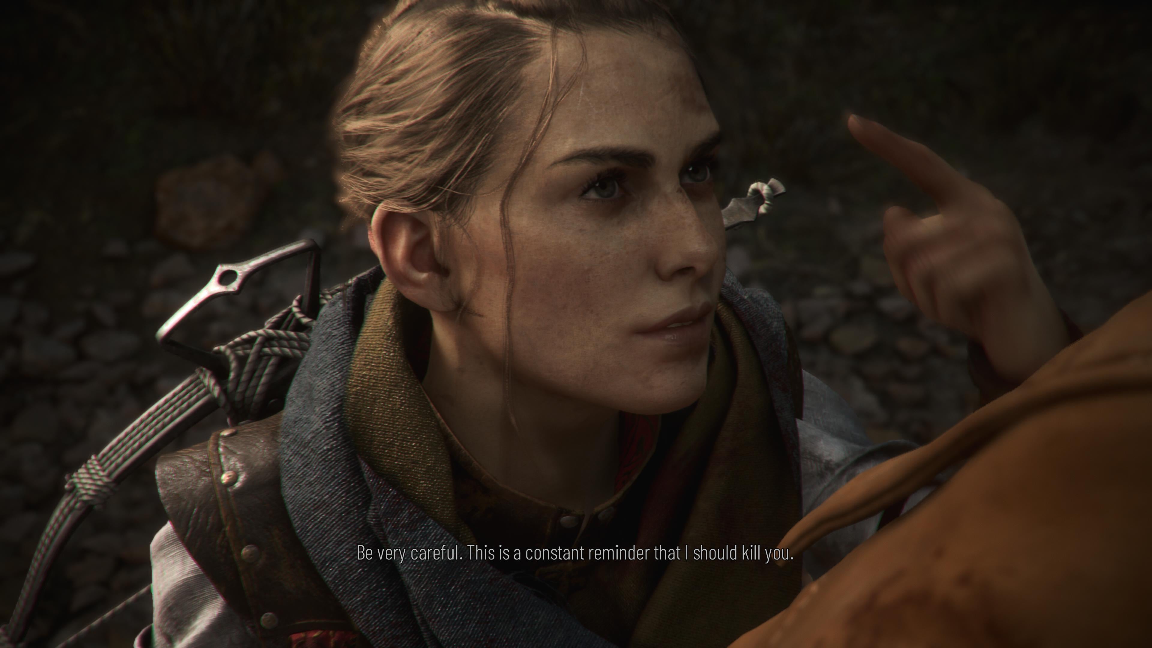 Heroine Amicia warns another character in A Plague Tale that she will kill them if they step out of line.