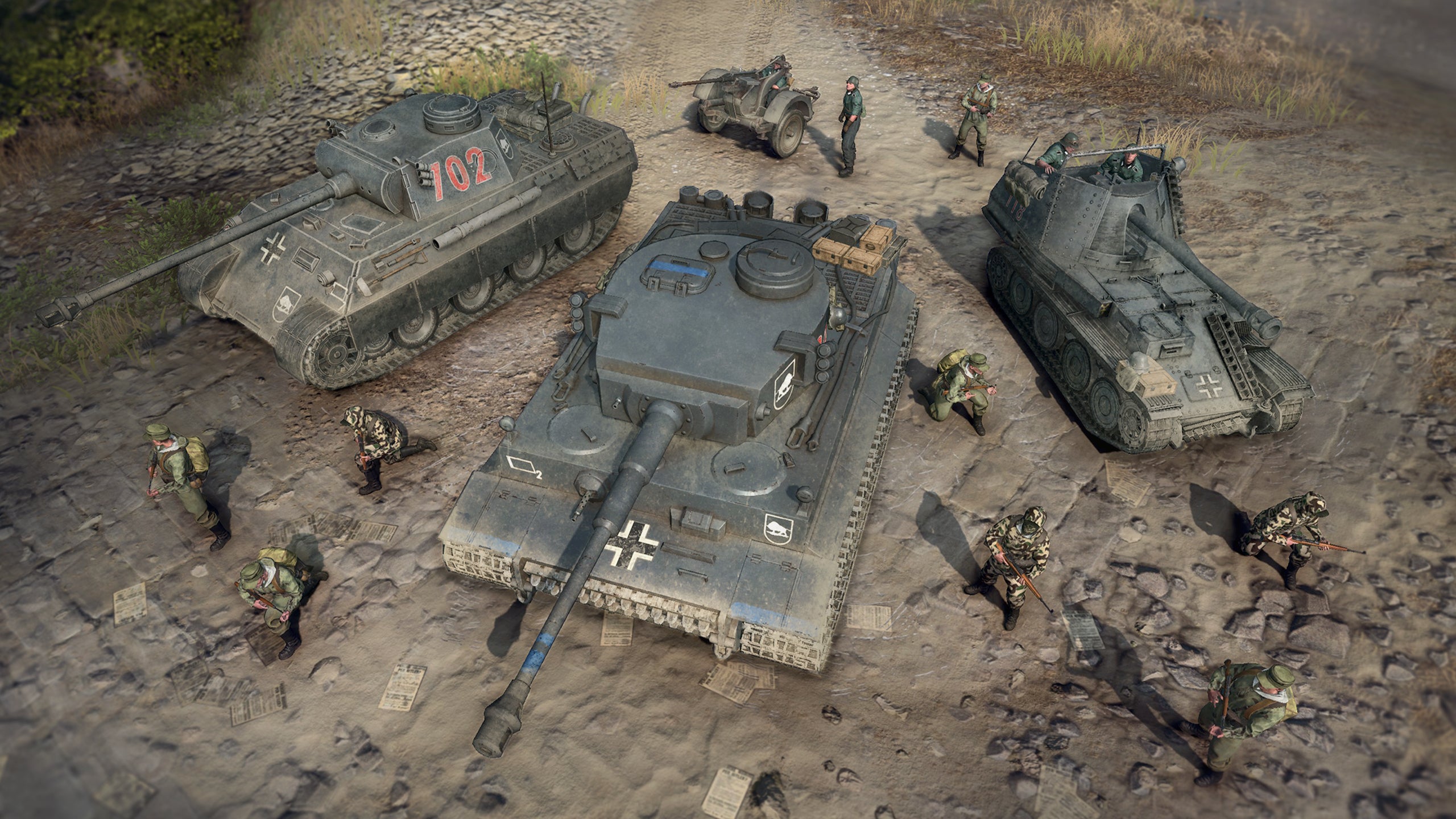 Avance de Company of Heroes 3: una vista de tres vehículos de la Wehrmacht, artillería y algunas unidades