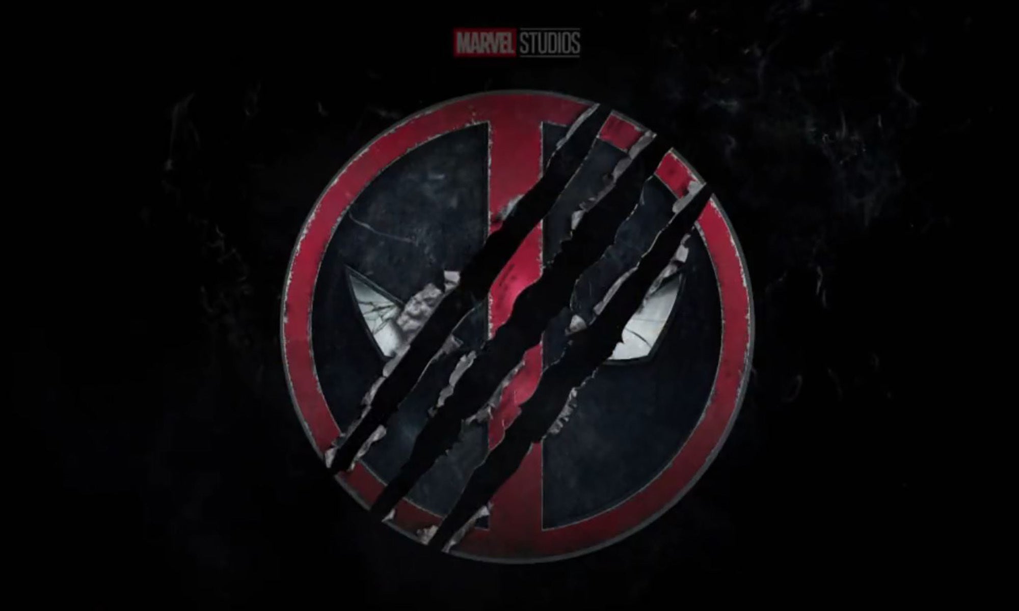 Deadpool logo with Marvel Studios logo in back with Wolverine claws