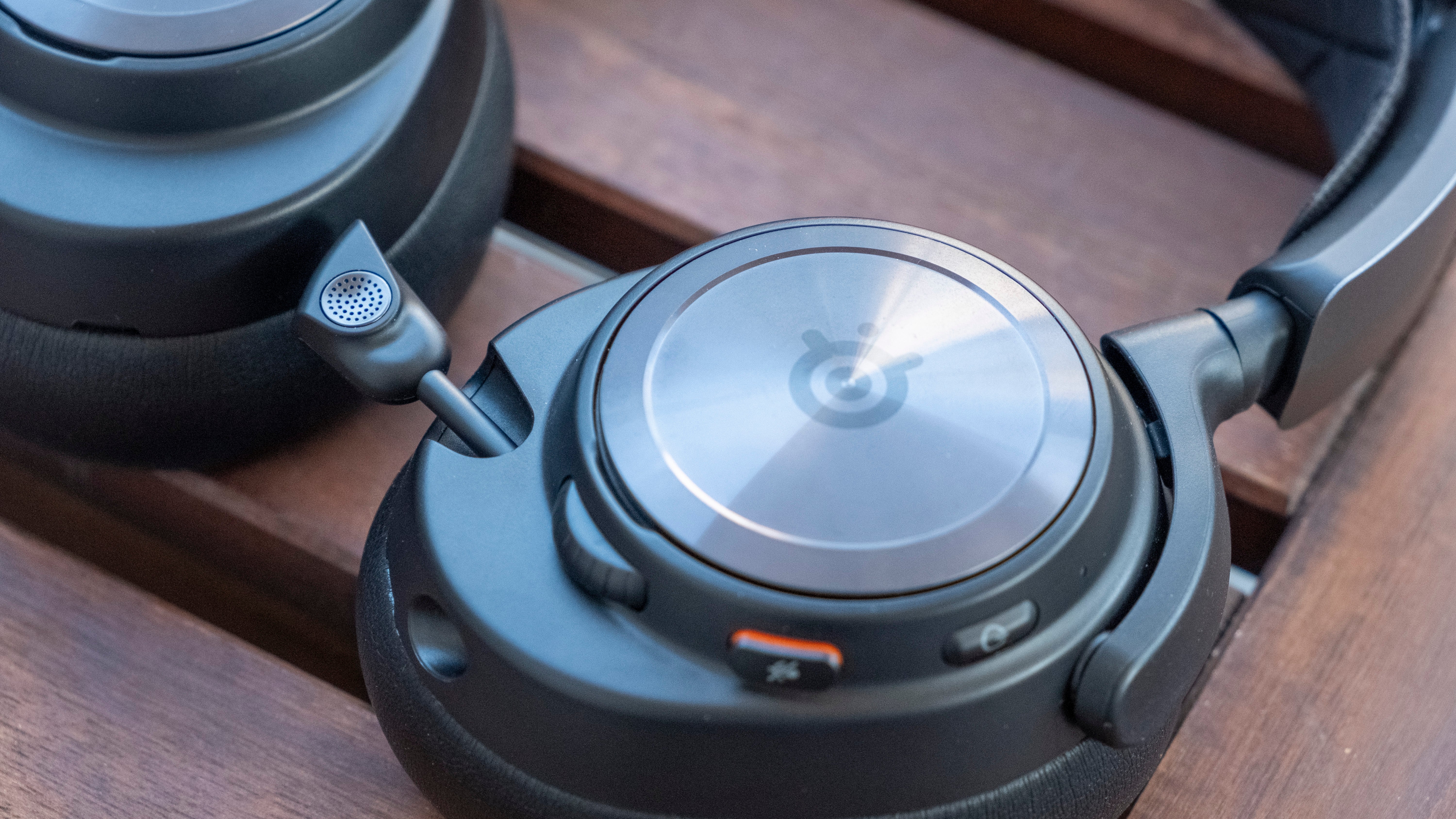 steelseries arctis nova pro and nova pro wireless gaming headsets and their base stations
