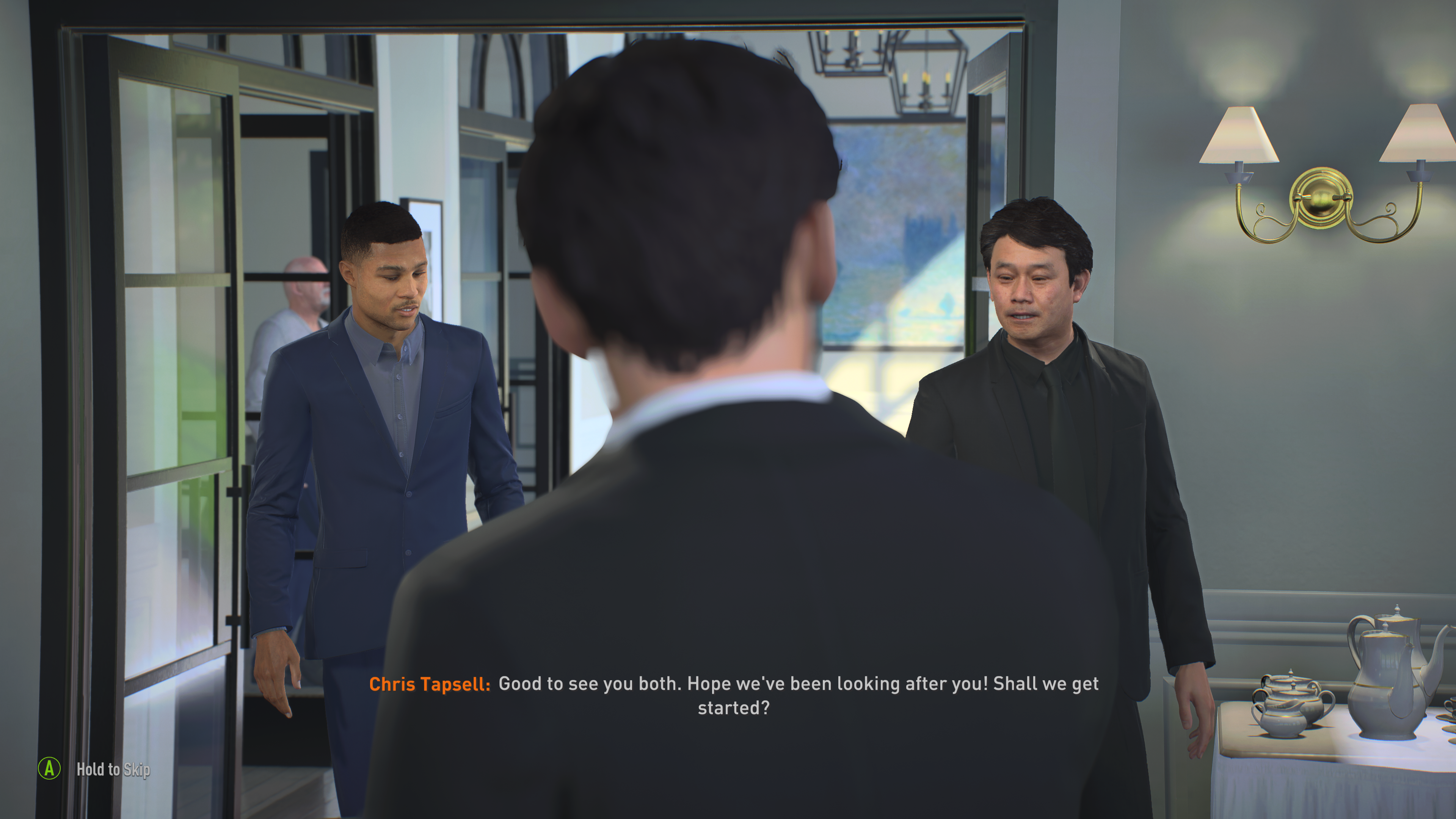 FIFA 23 review - career mode transfer negotiation cutscene showing Serge Gnabry and his agent walking into a fancy restaurant