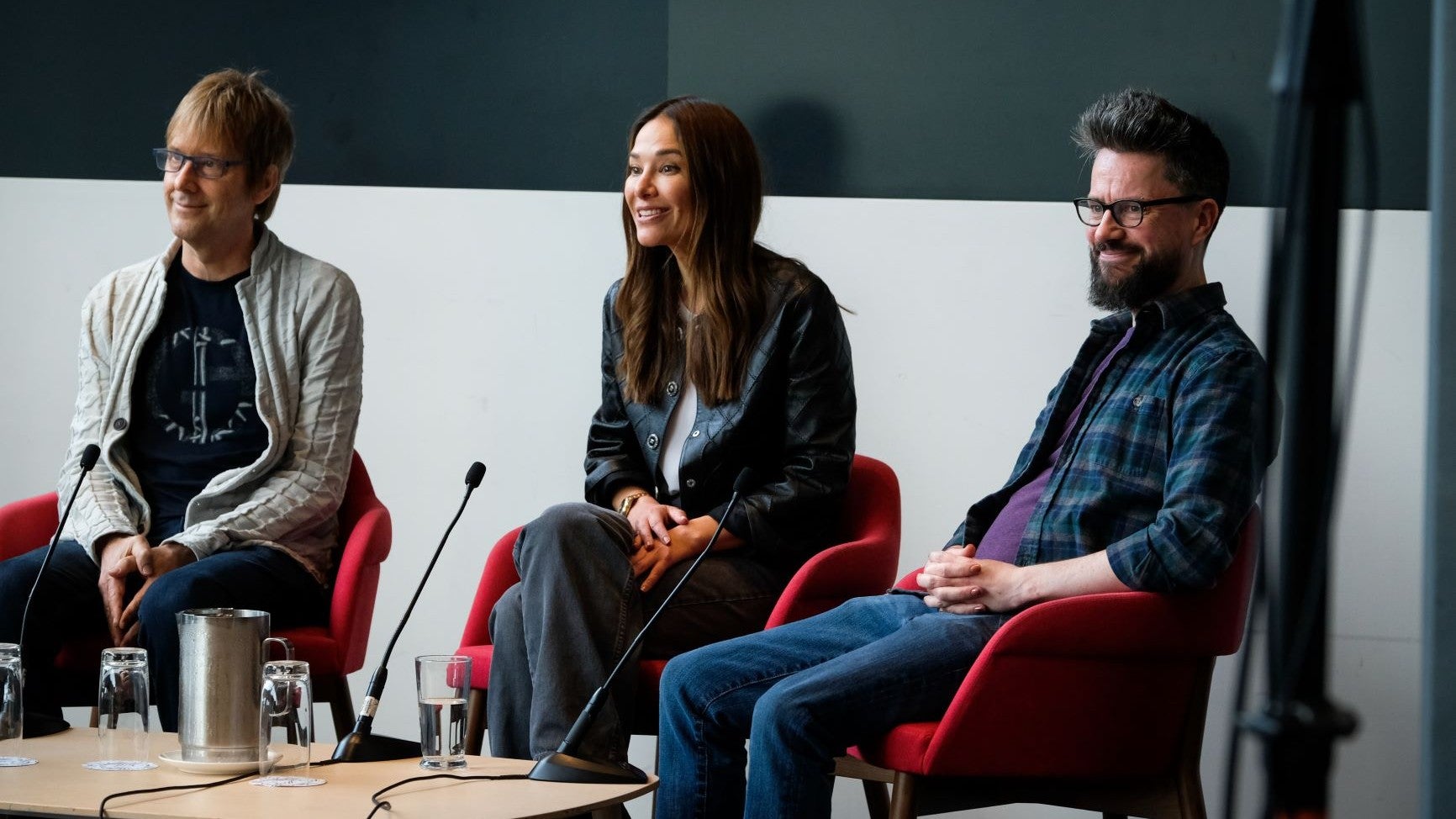 Mark Cerny, Jade Raymond, and Leon O'Reilly at a panel discussion