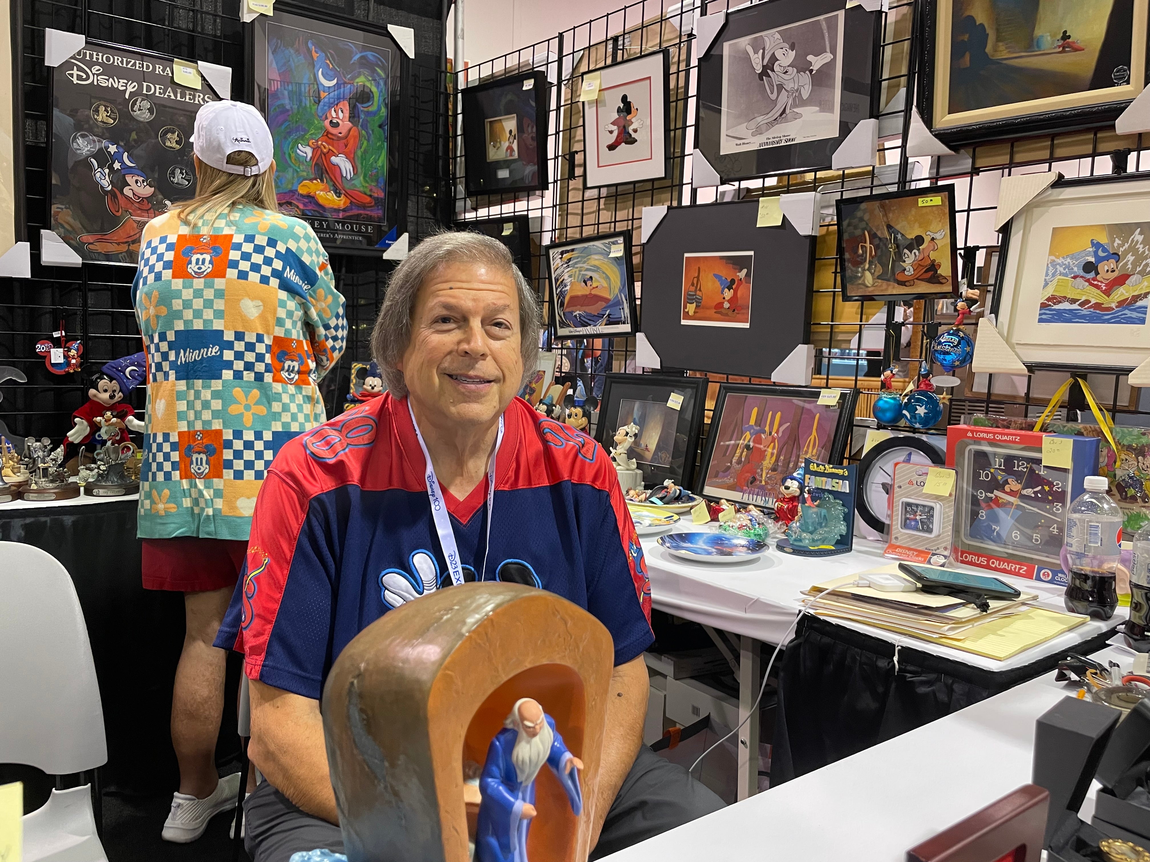 Photograph of Steve Waldman in his booth at D23