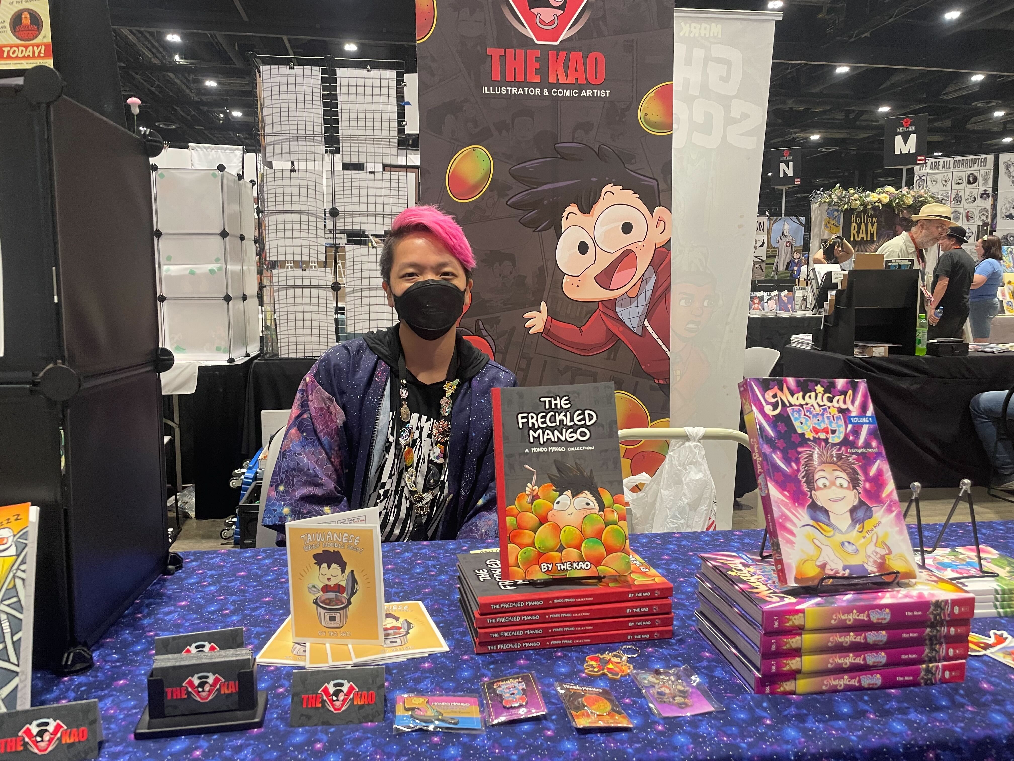 The Kao behind their table at C2E2