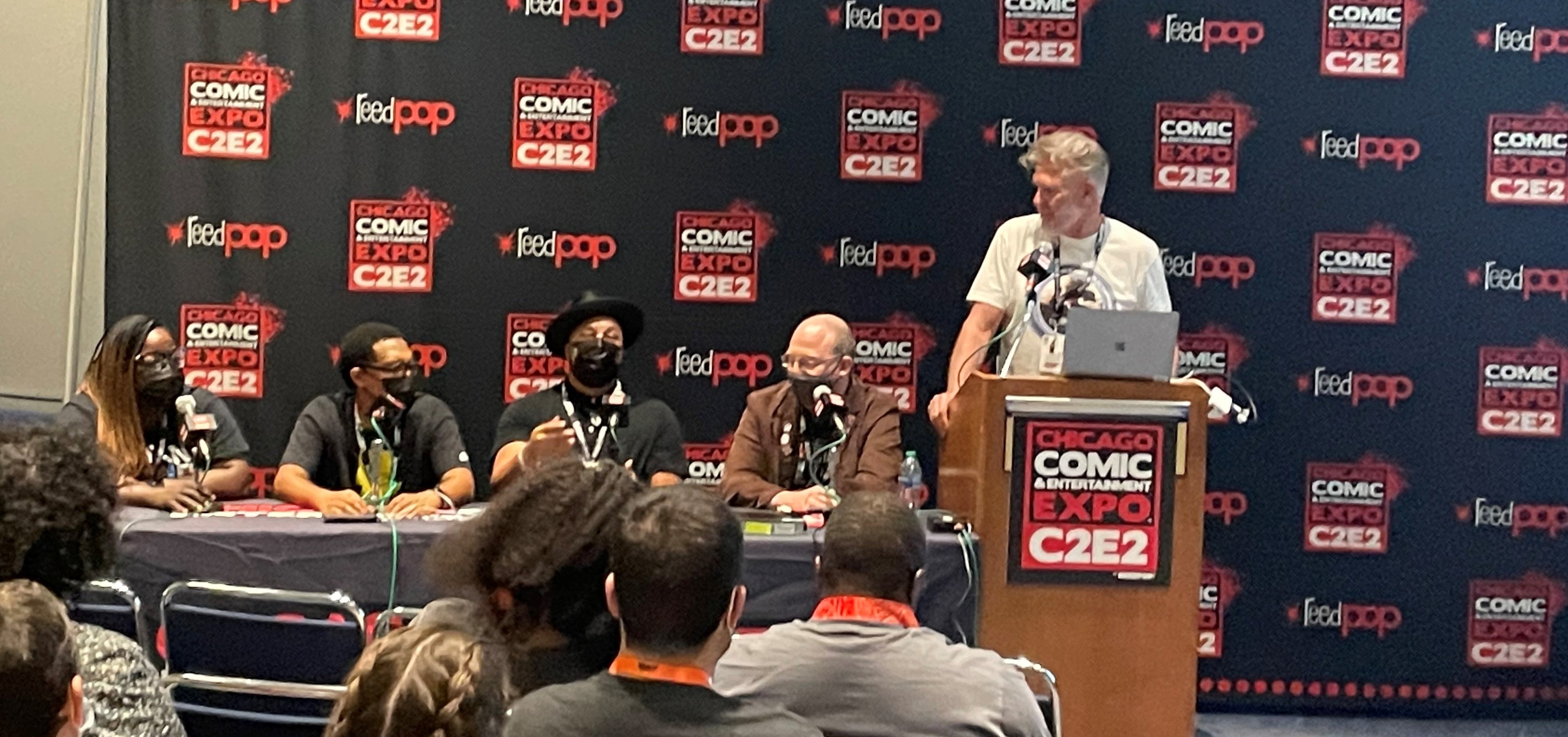 Mutant and Proud panel in front of C2E2 banner