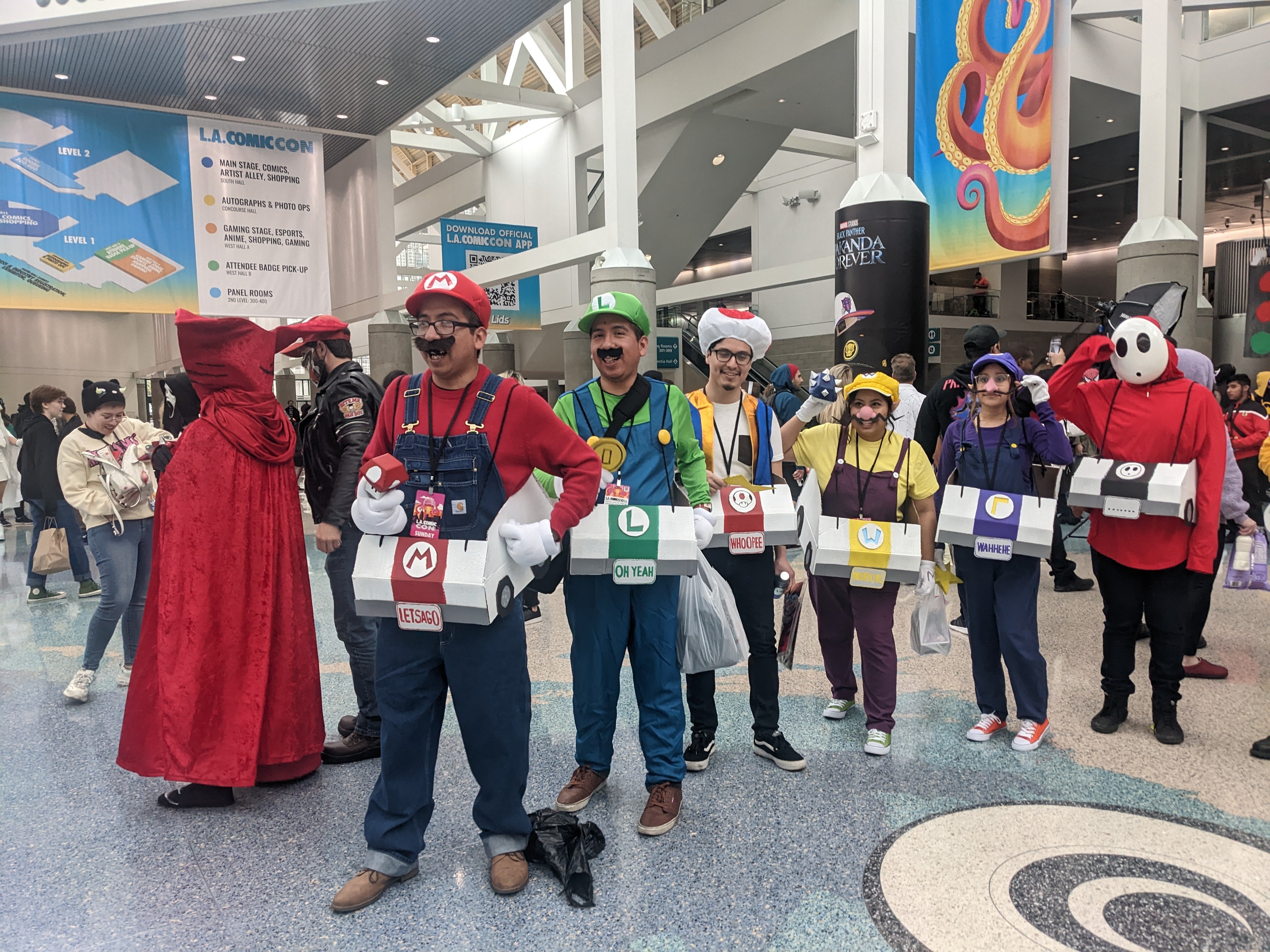 A photograph of six cosplayers dressed as MarioKart characters