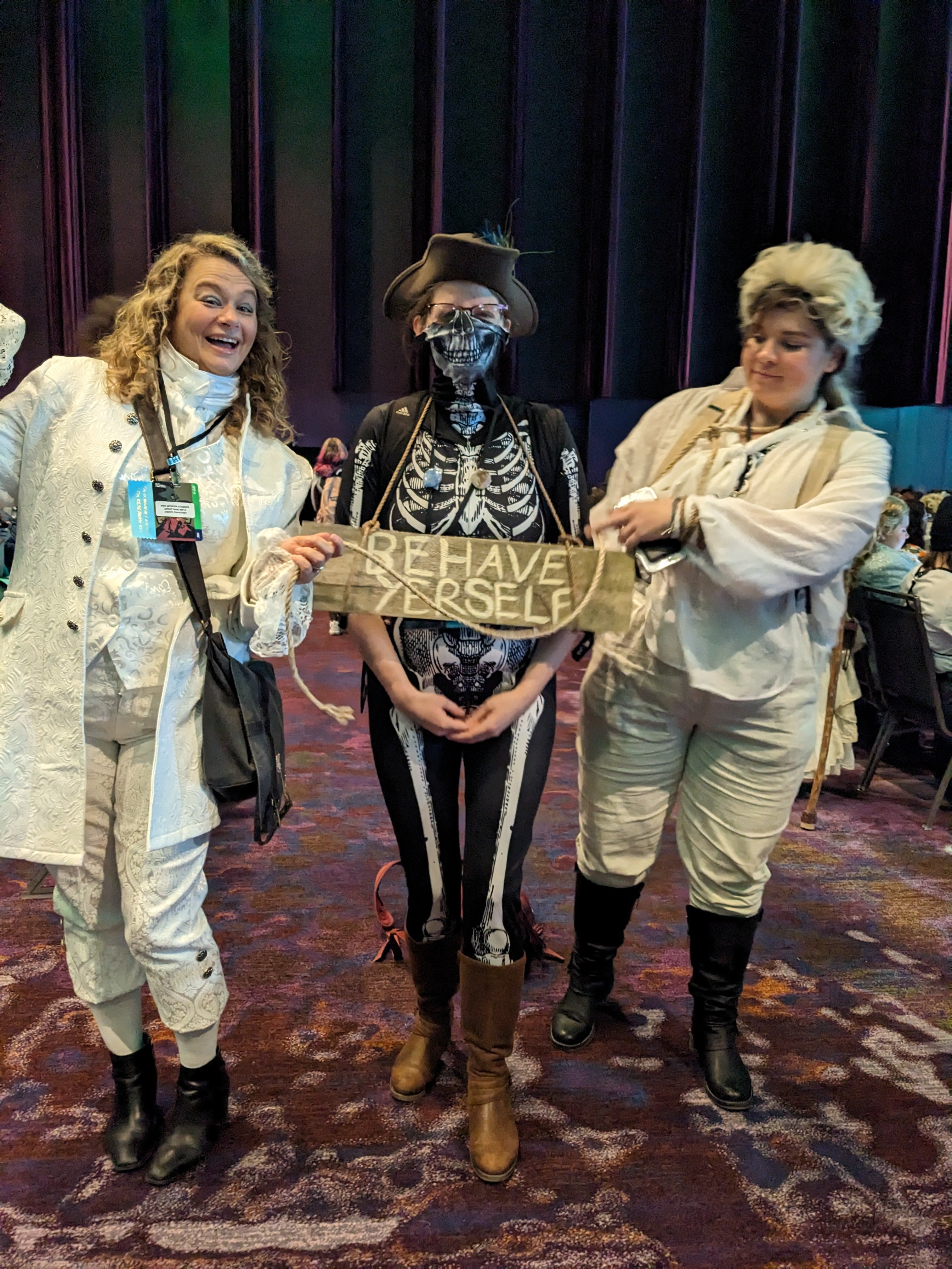 Three people in costume
