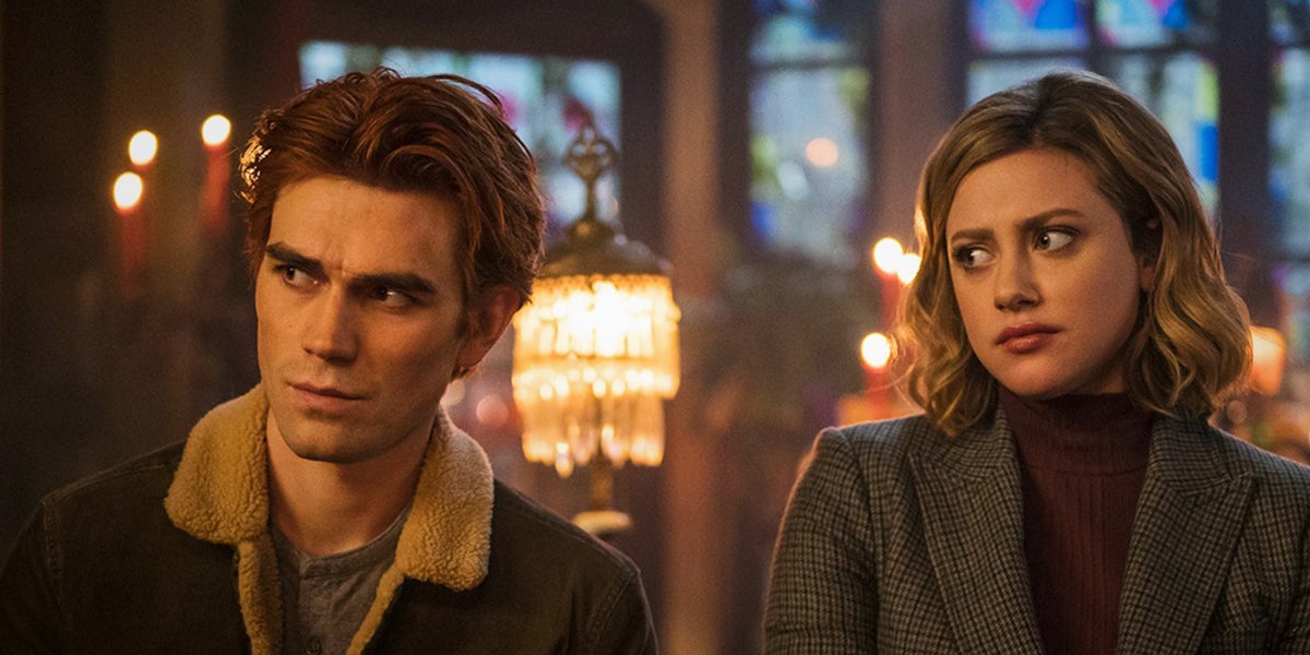 Riverdale season 6 still - KJ Apa as Archie on the left and Lili Reinhart as Betty on the right