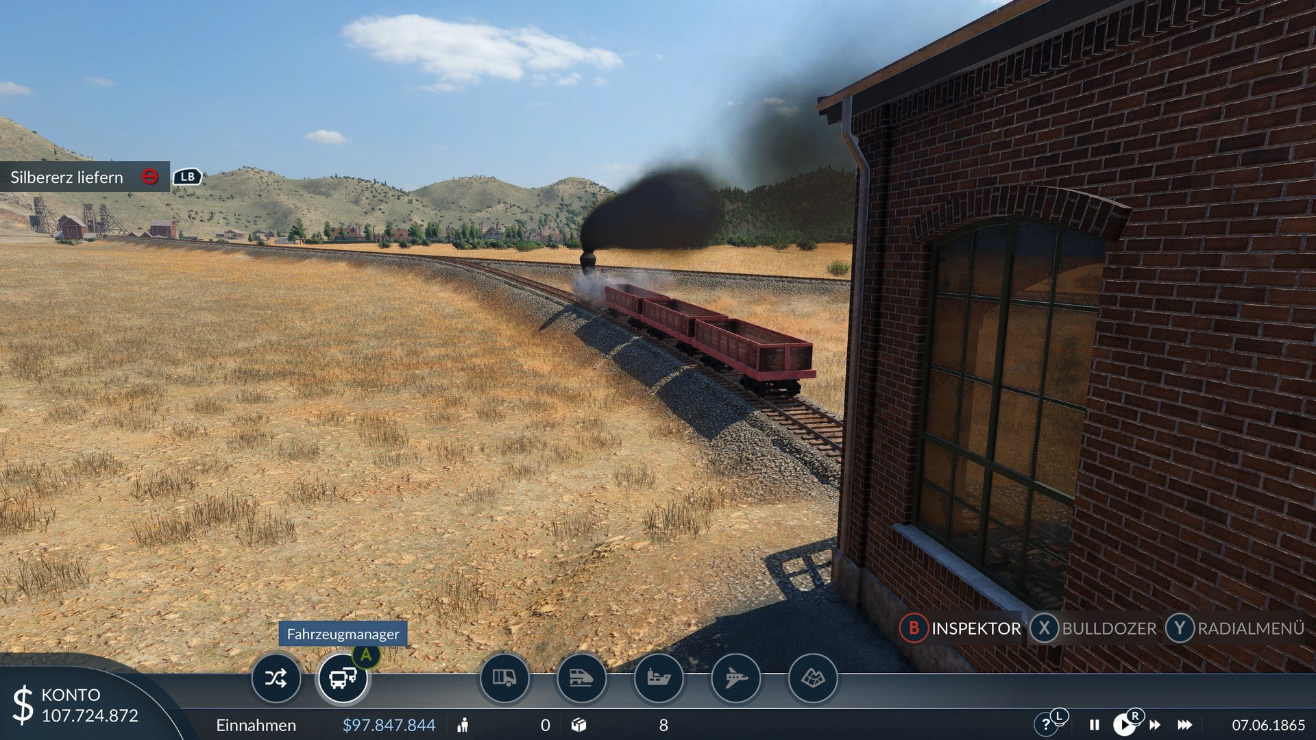 A train pulls out of a train depot in Transport Fever 2.