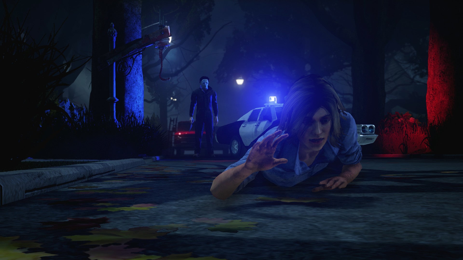 Halloween's Michael Myers approaches a victim crawling away in a promotional shot for Dead By Daylight DLC