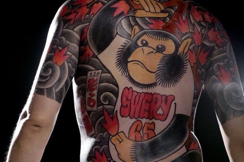 Deadly Premonition director Swery65 has the most amazing tattoo |  