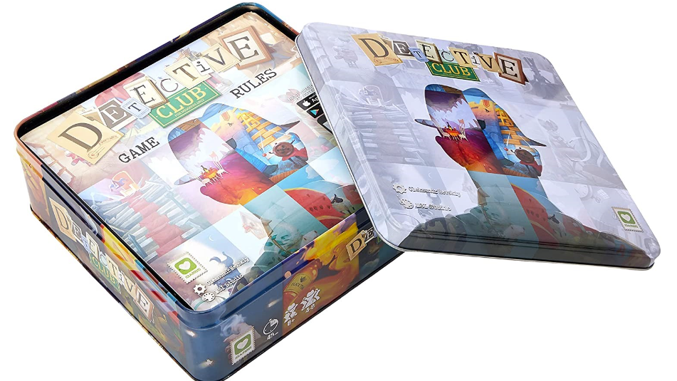 A product shot of the Detective Club board game, which comes in a large tin. The lid is slid off to reveal the top of the contents in the box. You can't see much of it beyond the game's artwork, which is a silhouetted figure wearing a hat - a detective's hat.