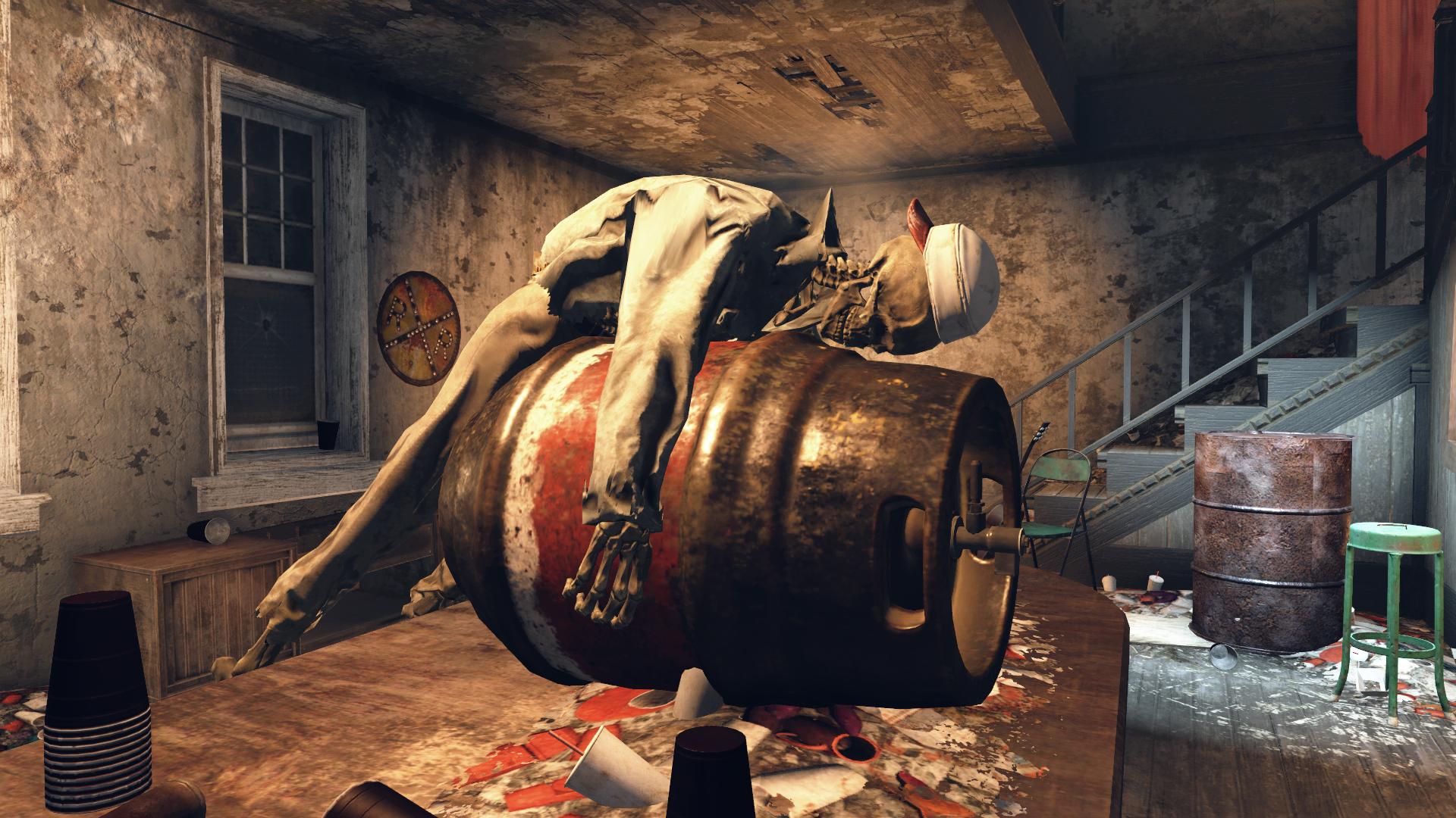 Fallout 76 State of the Game - a skeleton draped over a large beer keg on a table