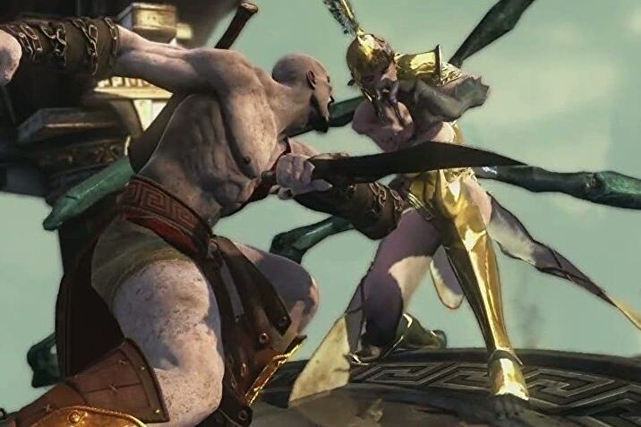 God of War Ascension screen of Kratos attacking one of the Furies, depicted as a woman fighter with spider legs coming out of her back