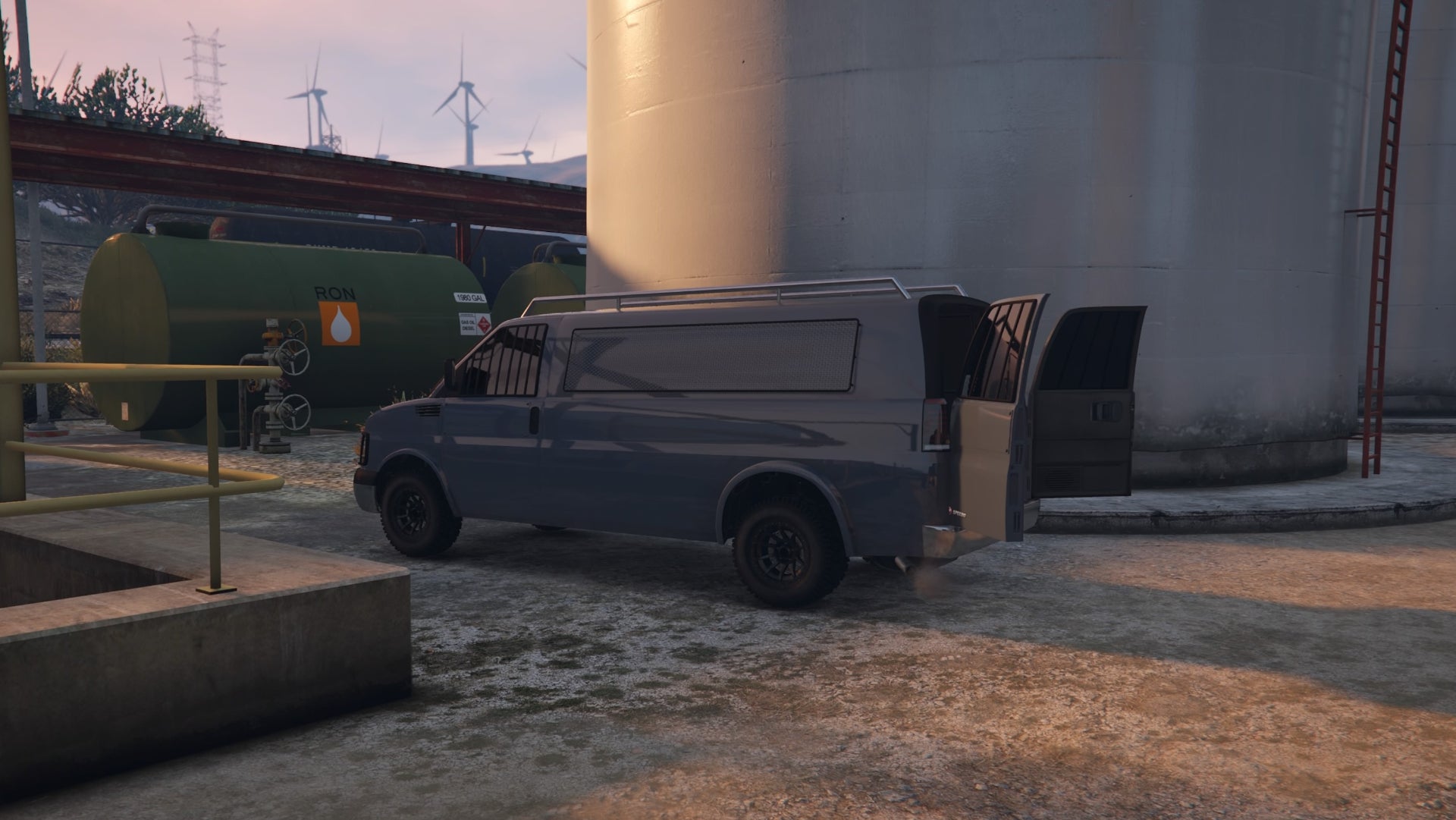 GTA Online, a side view of the Gun Van parked at the Power Plant with the rear doors open.
