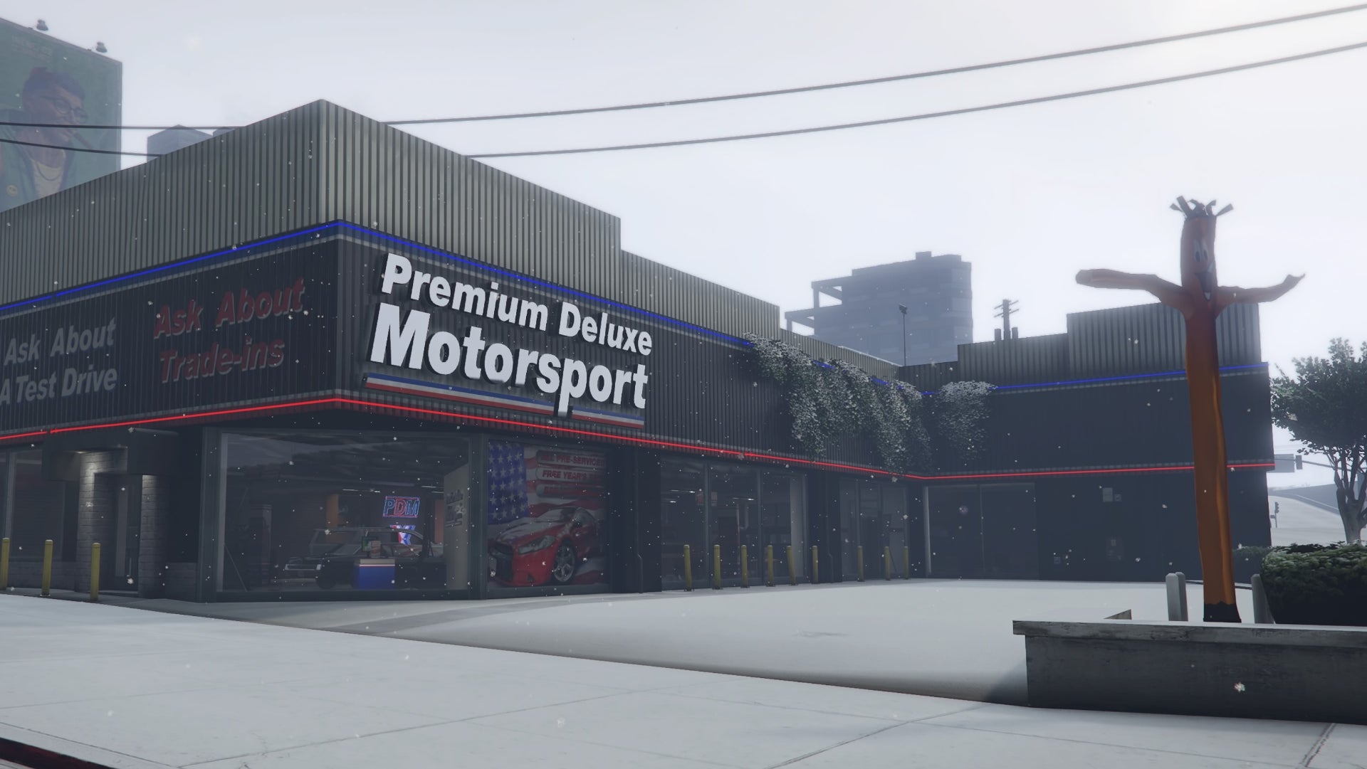 GTA Online, a view of Simeon's Showroom from the road outside.