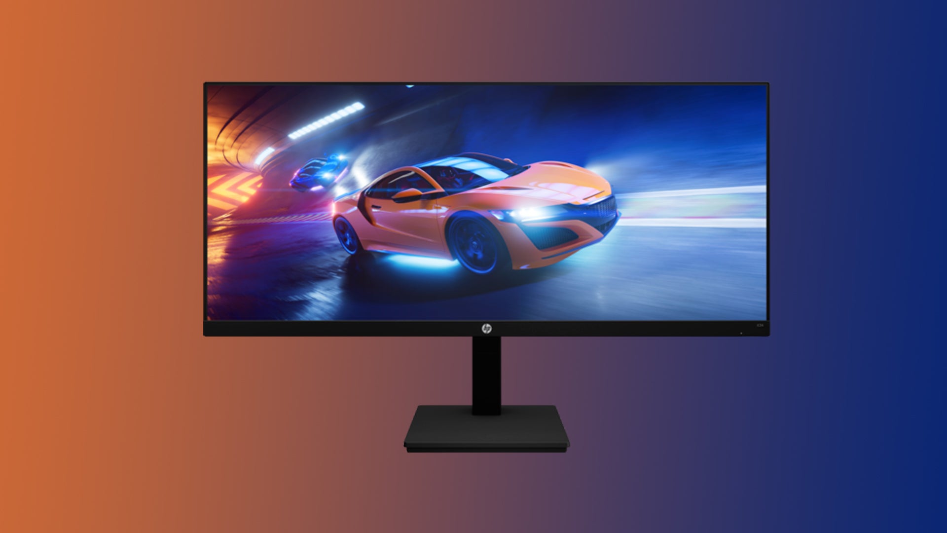 Image of an HP X34 ultrawide monitor on an orange to blue gradient background