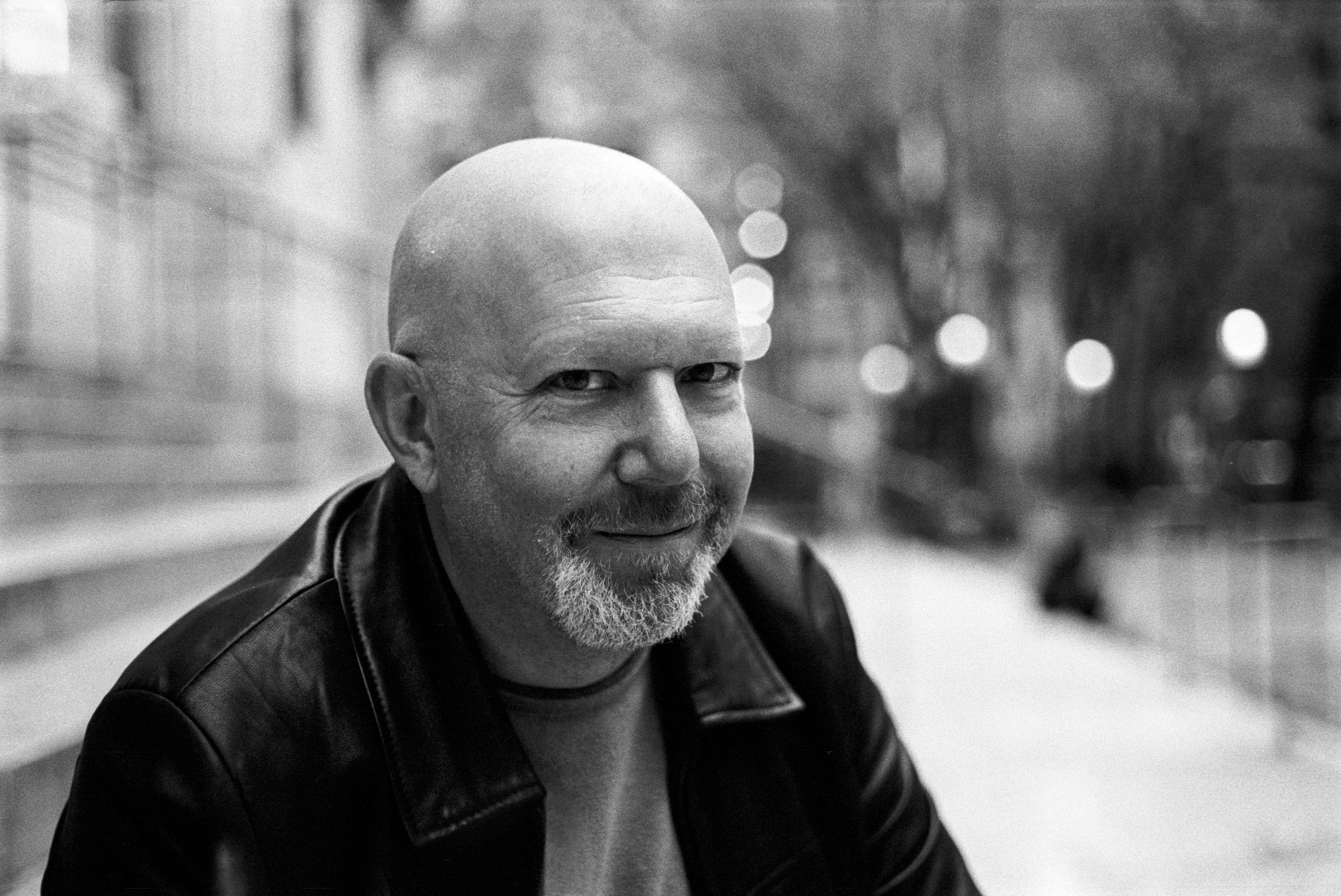 A black and white portrait of Marc Guggenheim