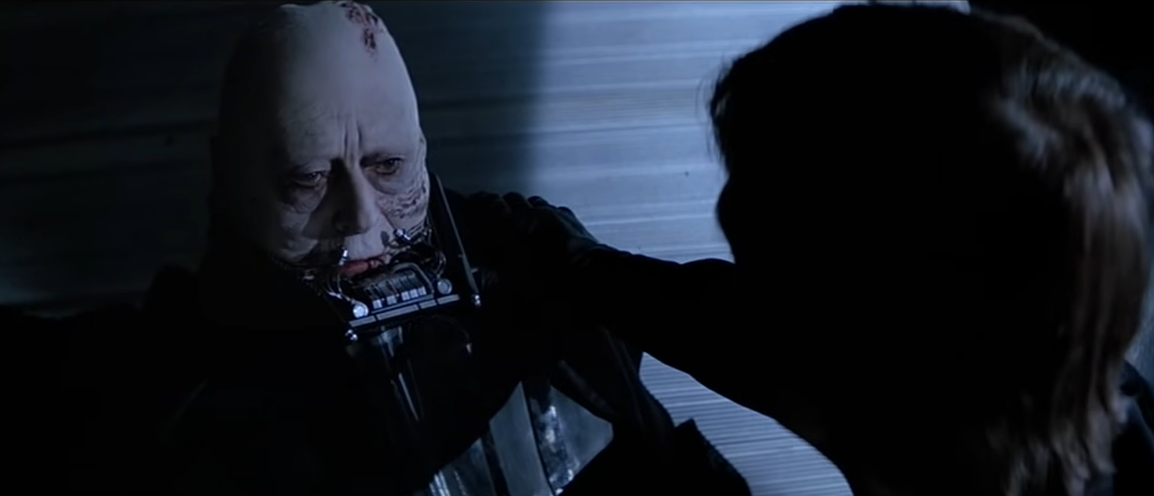 Still image of Return of the Jedi featuring an unhelmeted Darth Vader