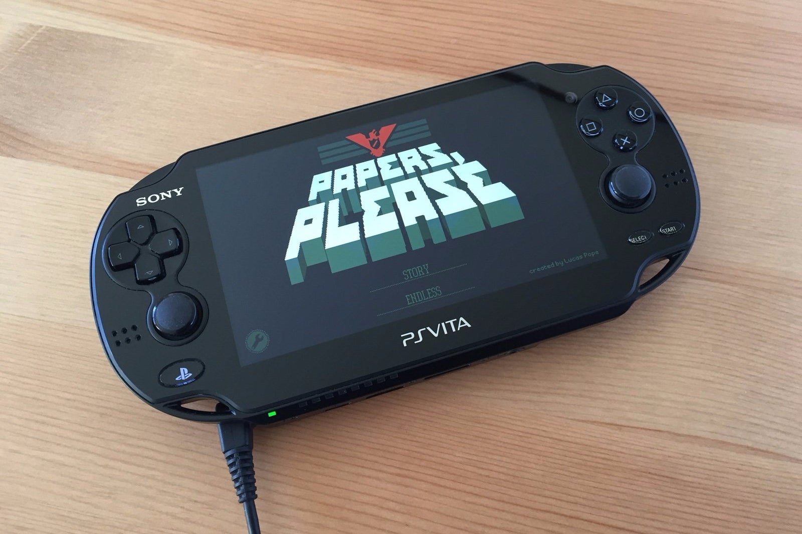 Image for Papers, Please Vita release rubber stamped