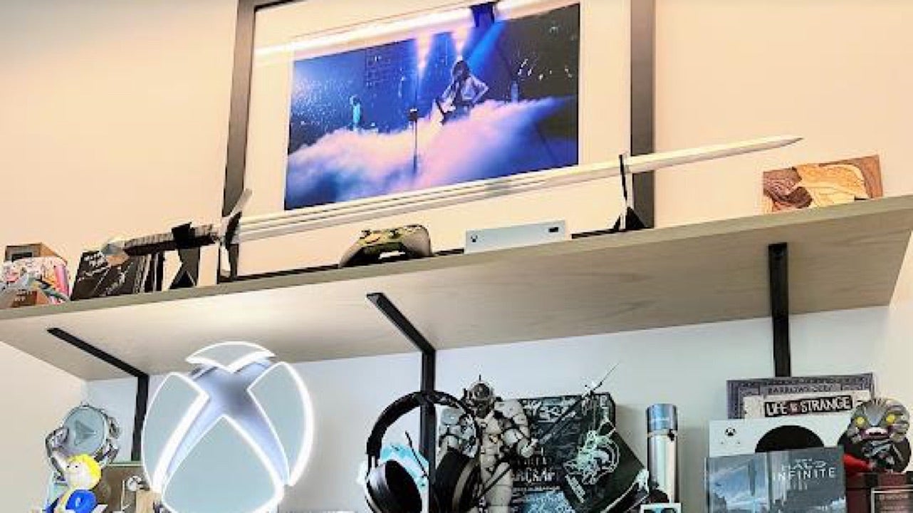 Image for Fans think Phil Spencer's shelf is teasing the Xbox Game Pass streaming box