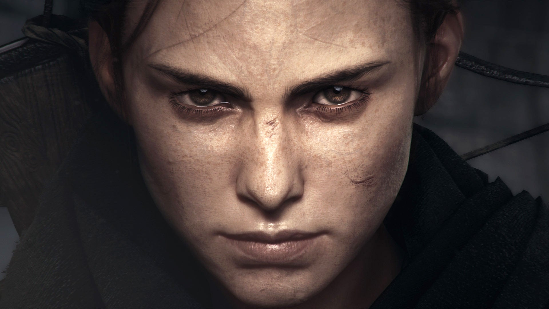A teenage girl stares with steely determination at the camera. It's Amicia, the main character in the Plague Tale games.