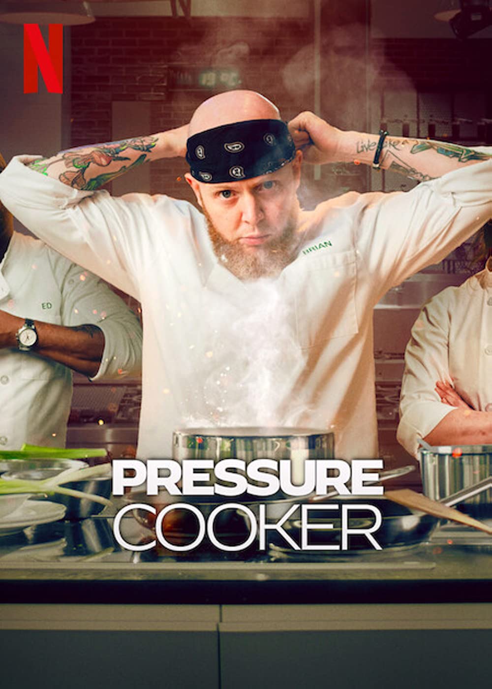 Photograph of a chef in a white jacket tying a black bandana to his head. In front of him is a stove with a steaming pot. The poster reads Pressure Cooker