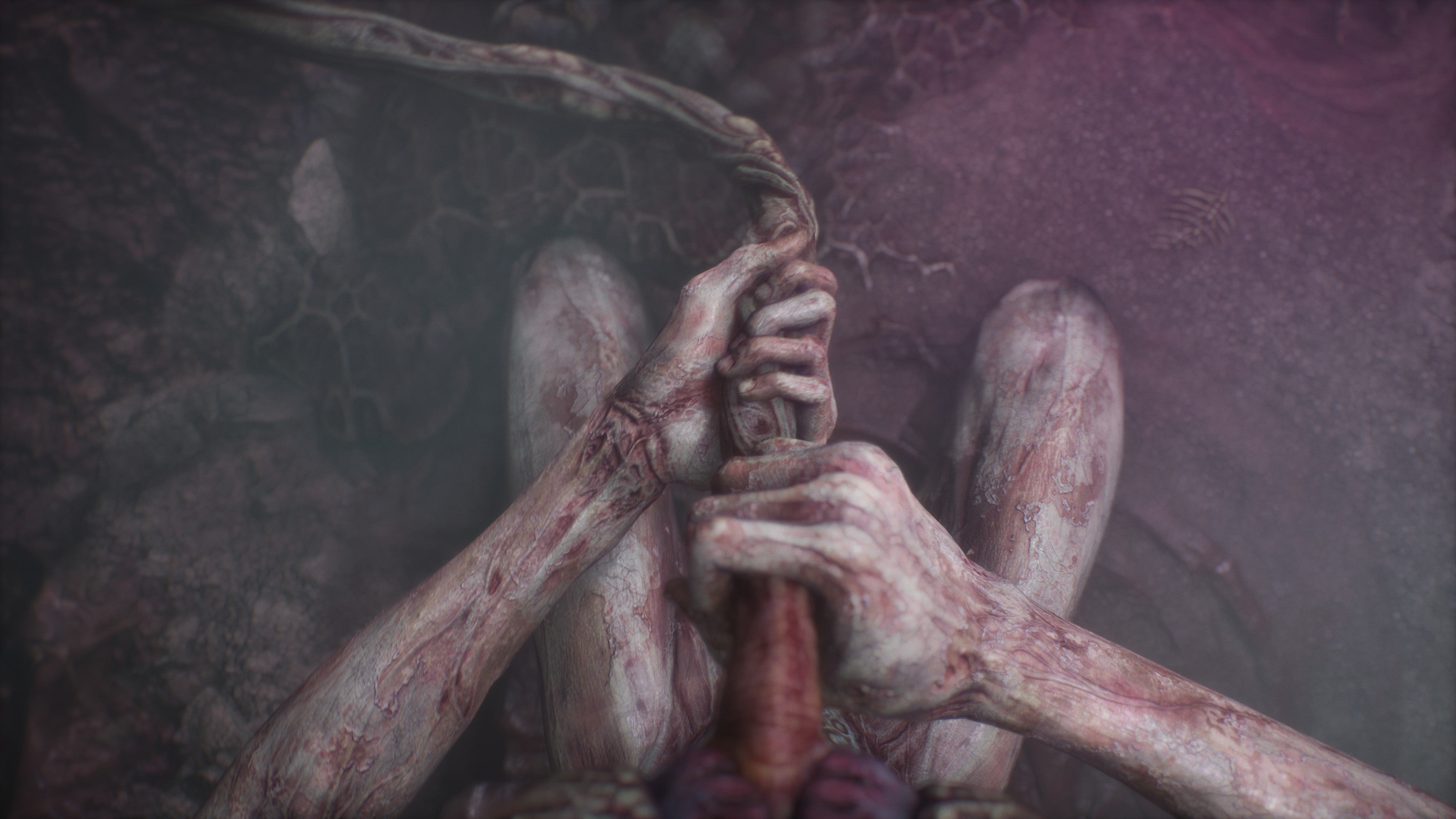Scorn review - your character pulls a large umbilical cord from its stomach