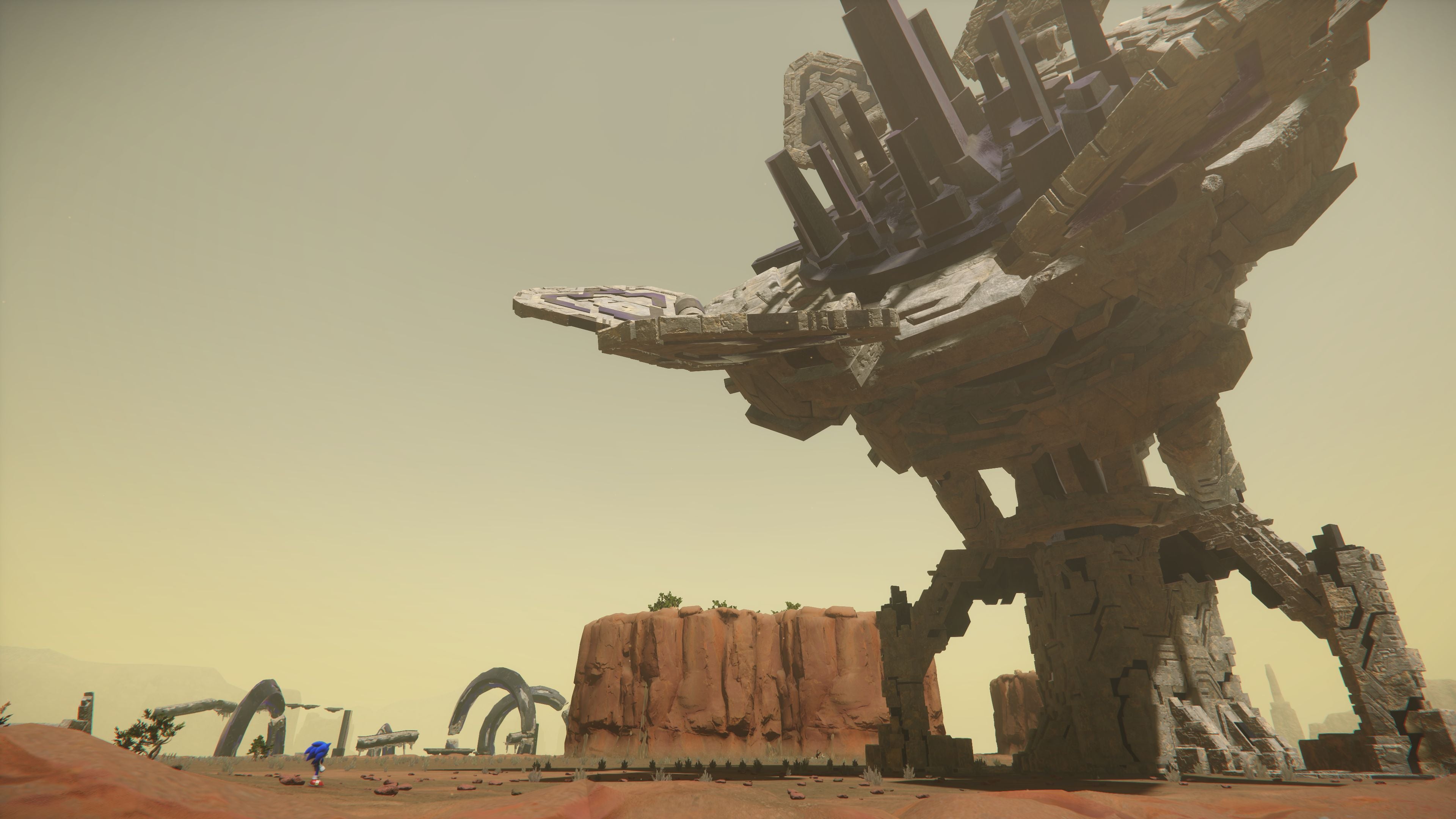 Sonic Frontiers preview - a desert with a giant stone object shaped like a satellite dish
