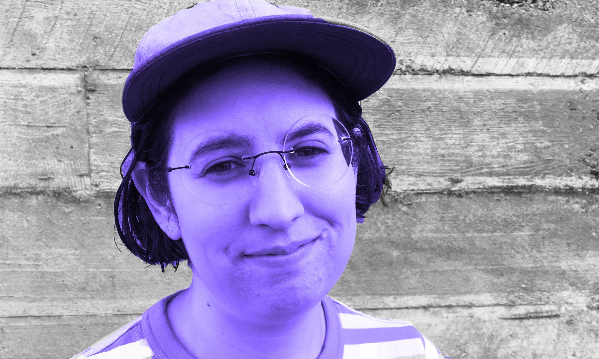 Purple image of Sophie Yanow wearing a hat and glasses