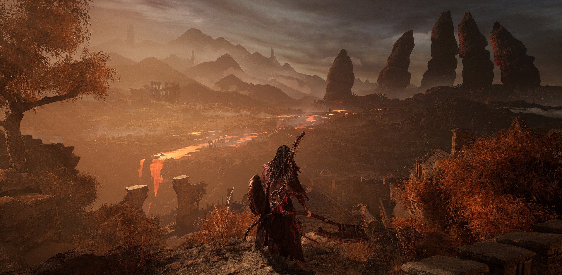 Pratinjau Lords of the Fallen - pemain melihat ke dunia luas lava cair dan bebatuan merah-coklat