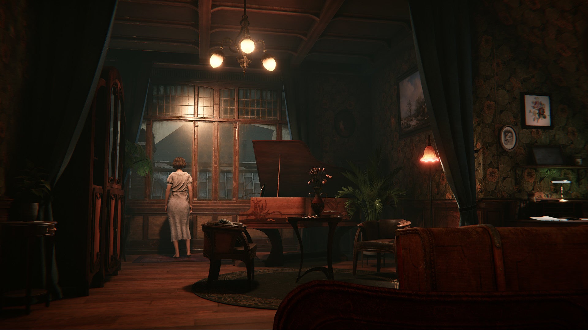 A woman looks out the window of a lavish room with a grand piano in Syberia: The World Before