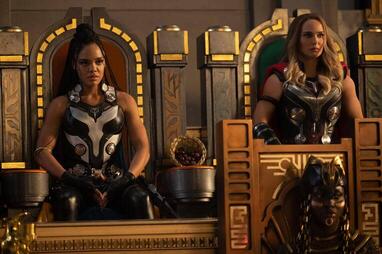 Jane Foster and Valkyrie sitting side by side in throne chairs