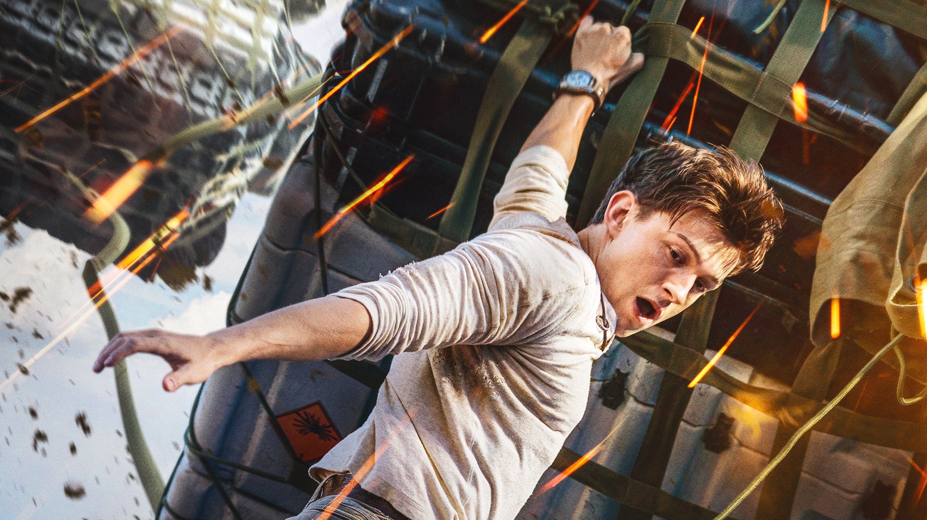 Image for Uncharted film trailer shows Tom Holland swinging onto a pirate ship being carried by a helicopter